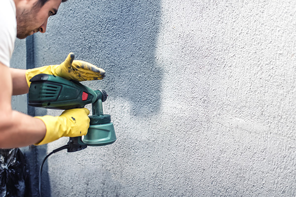 Spray painting concrete wall